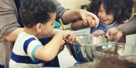 Kids helping to make cookies.