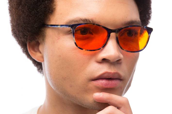 BON CHARGE Blue Light Blocking Glasses a man wearing a pair of sunglasses that block harmful blue light