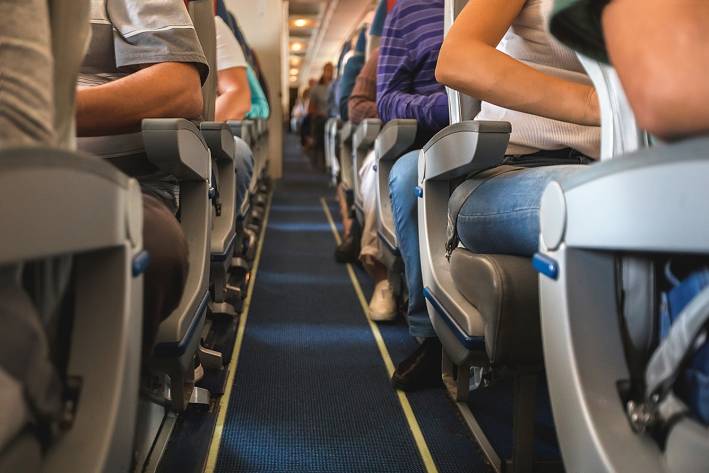 Trouble at 30,000 Feet Rows of seating on an air plane.