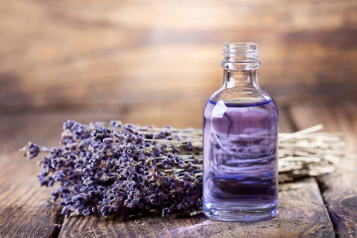 Manage Stress with Supplements A bottle of calming lavender essential oil