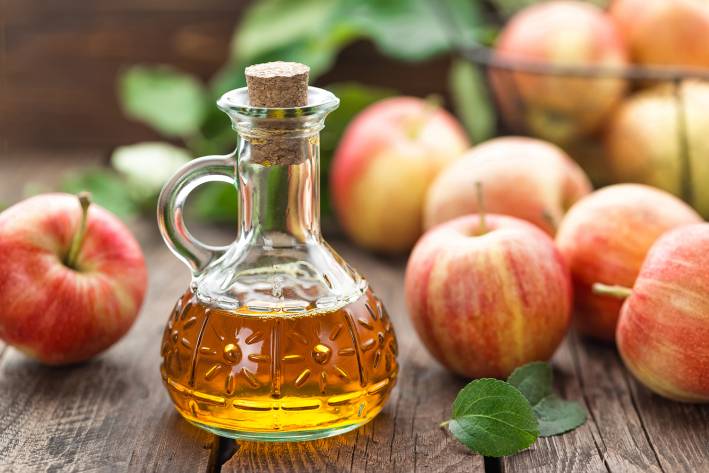 Apple Cider Vinegar a flask of apple cider vinegar