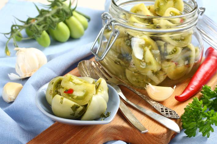 Sweet Green Tomato Pickles a jar of pickled green tomatoes