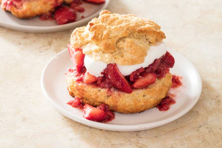 Strawberry Shortcakes biscuits with strawberries and cream in the middle