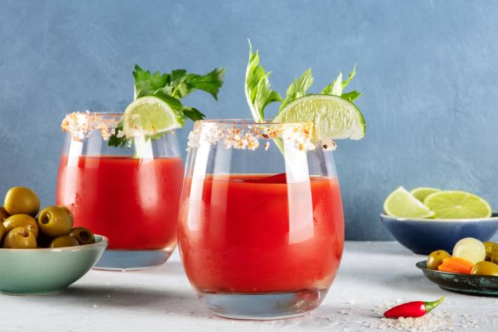 Bloody Mary Mocktail two glasses of non-alcholic bloody mary with garnish