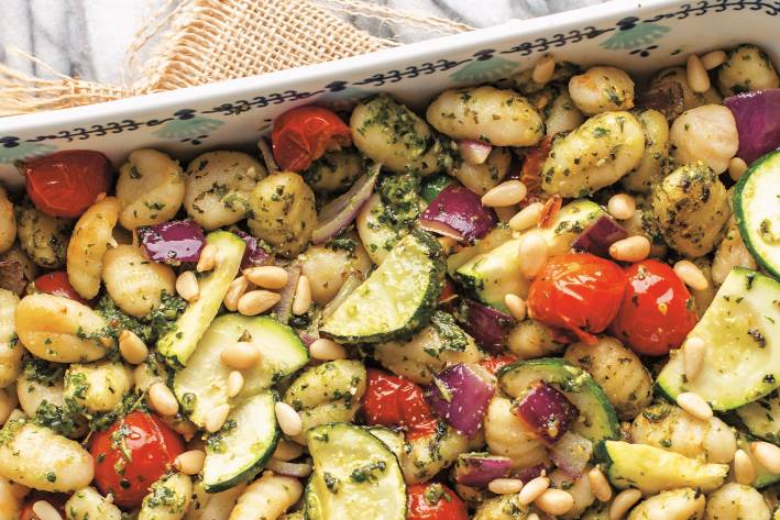 Pesto-Roasted Gnocchi & Veggies gnocchi and veggies with pesto in a pan
