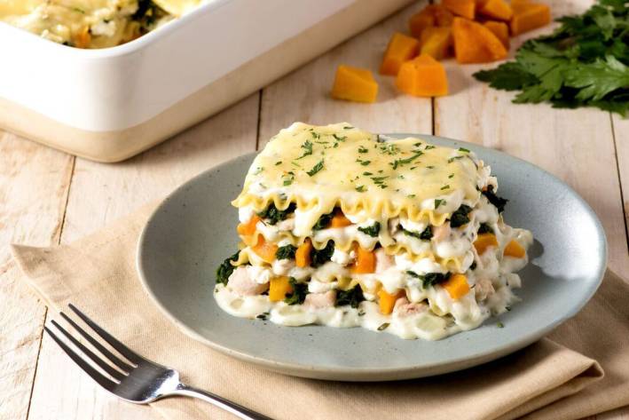 Thanksgiving Leftovers Lasagna A slice of lasagna made with thanksgiving leftovers