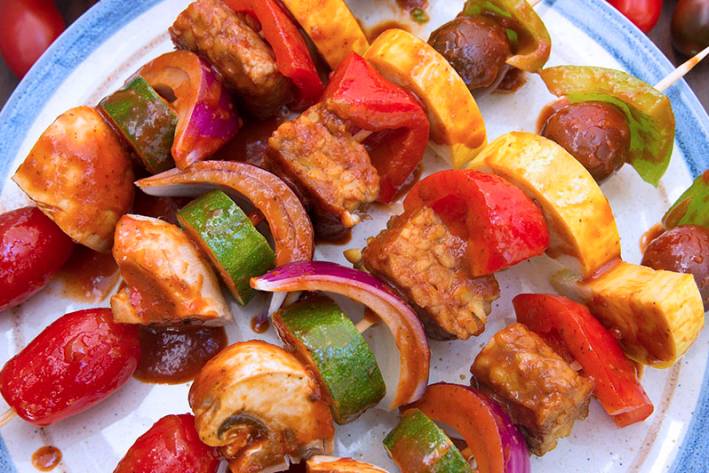 Barbecued Shish Kebobs A plate of skewered vegetables and tempeh