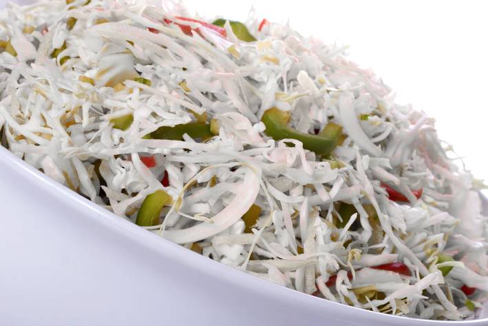 Bell Pepper Cole Slaw a bowl of shredded cabbage and bell peppers