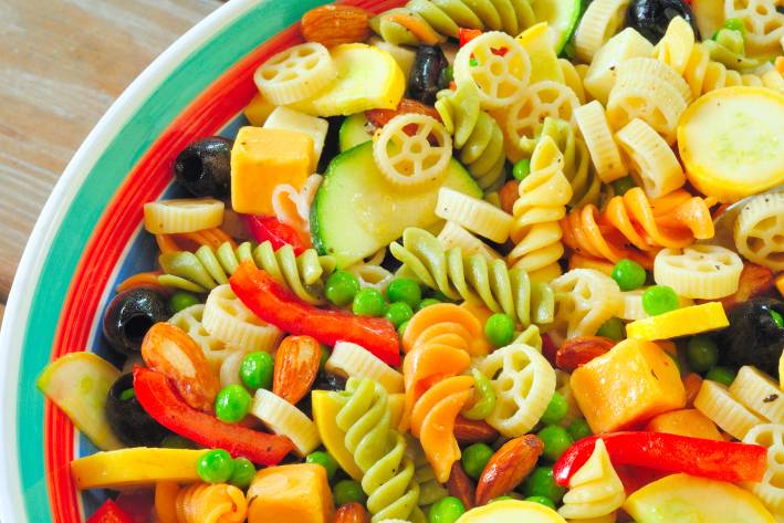 Pasta Salad with Grilled Summer Vegetables a bowl of pasta tossed with summer veggies
