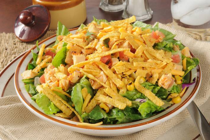 Spicy Taco Salad a bowl of taco salad with tortilla strips