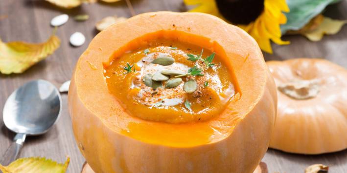Pumpkin Soup soup served in a carved pumpkin