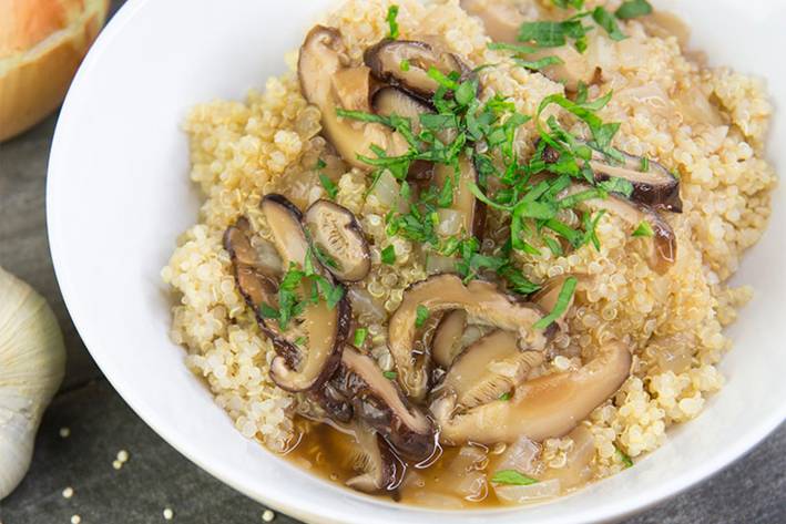 Quinoa with Shiitake Gravy a bowl of mushrooms over quinoa