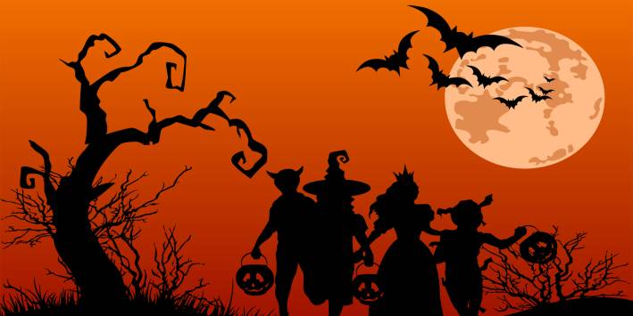 8 Tips for Hosting a Haunted Halloween Party Children trick or treating cartoon image.