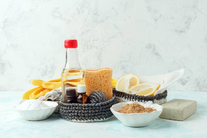 Eco-Friendly Spring Cleaning eco-friendly natural cleaning products on a kitchen table