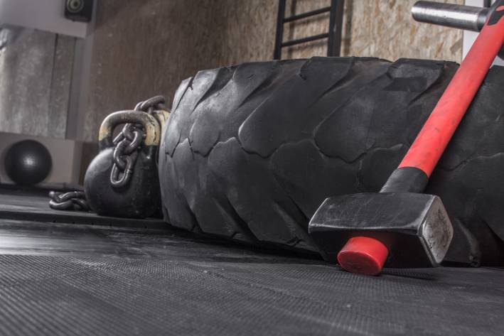 My Life with CrossFit... and Why You May Want to Try It Different crossfit equipment used for crossfit training in a gym.