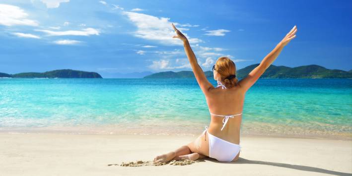Boost Your Mood Woman in a good mood on the beach