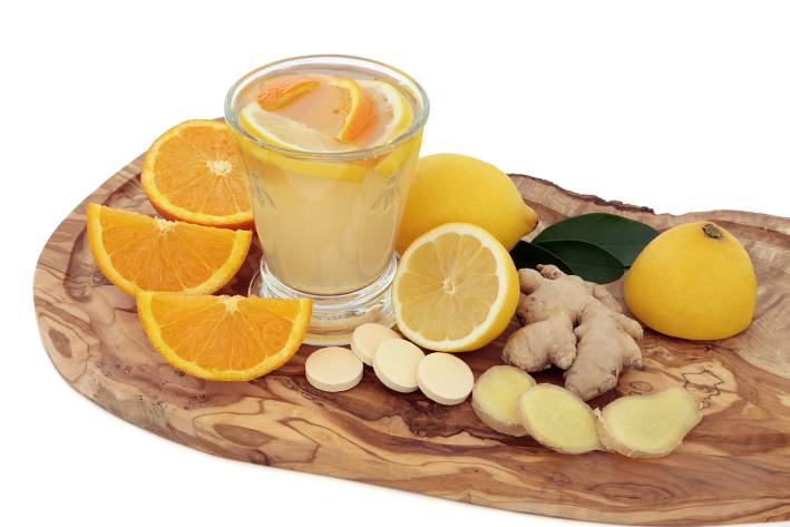Benefits of Vitamins C and D a vitamin health tonic with oranges